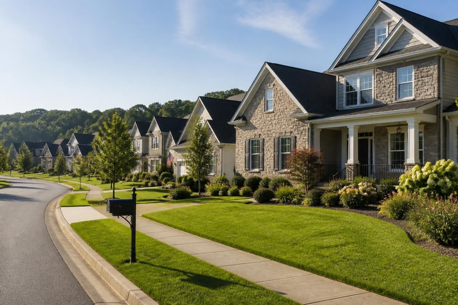 Upscale suburban neighborhood with manicured lawns.